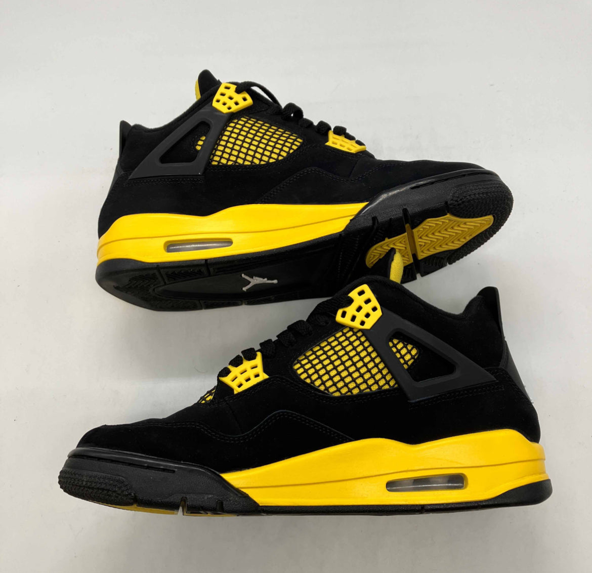 Jordan 4 Retro Thunder (Auténtica Reventa)