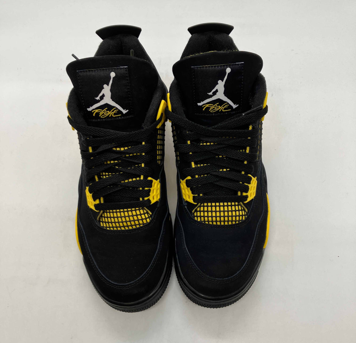 Jordan 4 Retro Thunder (Auténtica Reventa)