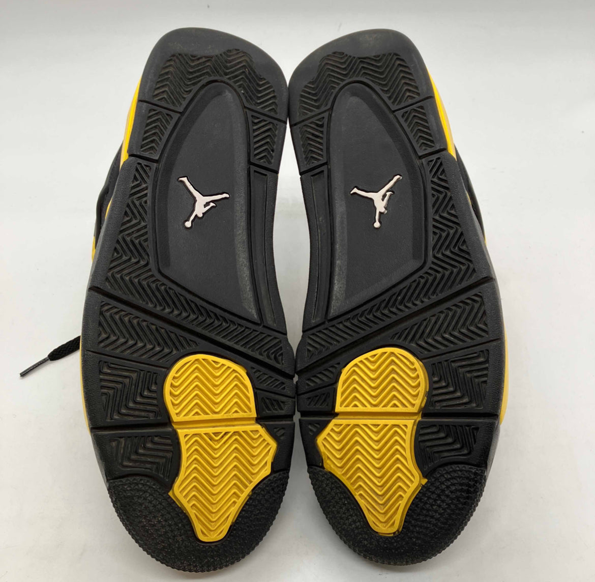 Jordan 4 Retro Thunder (Auténtica Reventa)